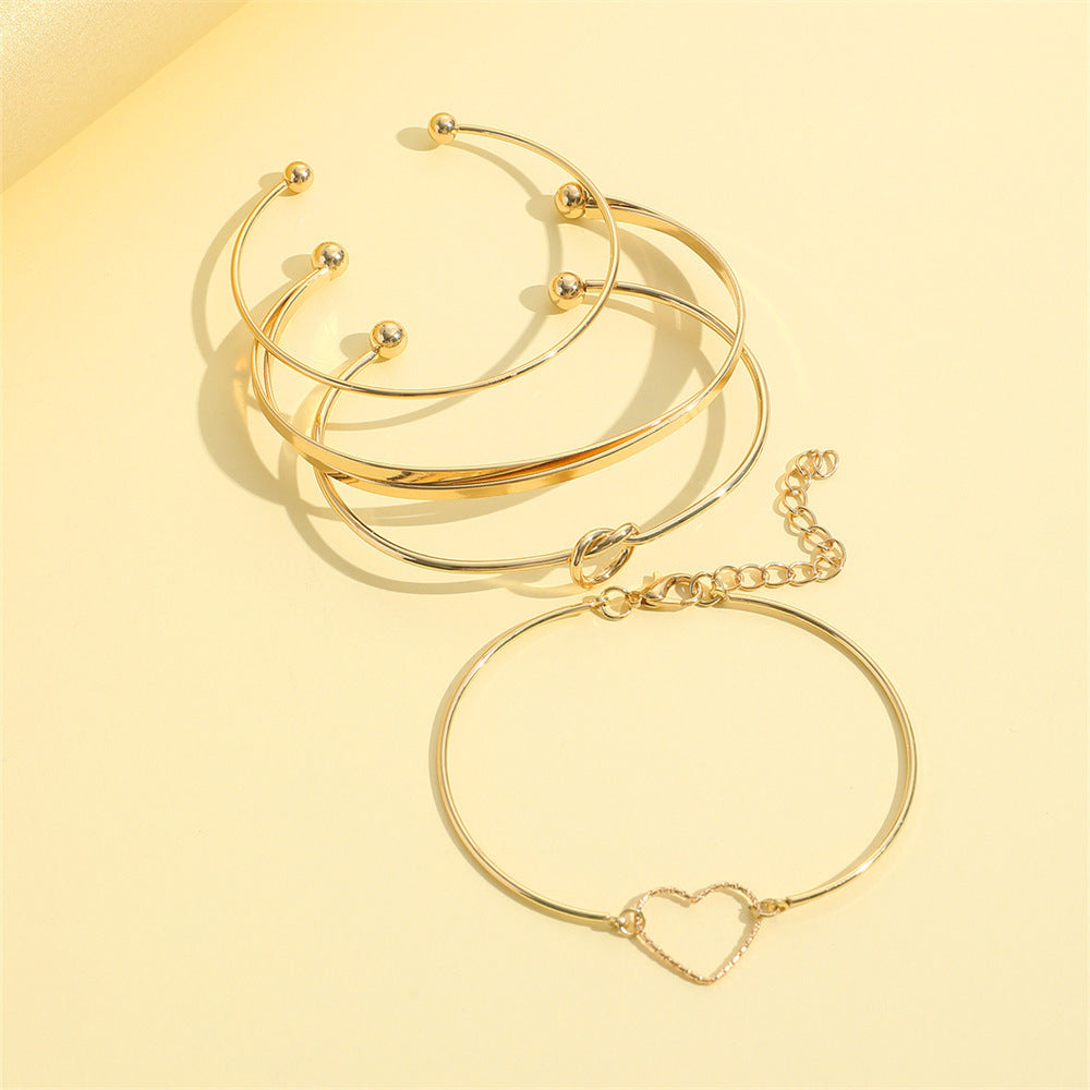 Bracelet vintage plaqué or – Cœur, lettres et cristaux pour femme