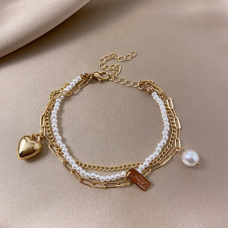 Bracelet Double Couches Cœur et Perles – Charme Rétro et Raffiné - 𝓑𝓲𝓳𝓸𝓾𝔁𝓒𝓪𝓮𝓵𝔂𝓼 - Collier - 𝓑𝓲𝓳𝓸𝓾𝔁𝓒𝓪𝓮𝓵𝔂𝓼 -