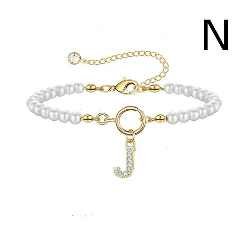 Bracelet initial – Perles 6 mm et pendentif lettre A - Z - 𝓑𝓲𝓳𝓸𝓾𝔁𝓒𝓪𝓮𝓵𝔂𝓼 - bracelet - 𝓑𝓲𝓳𝓸𝓾𝔁𝓒𝓪𝓮𝓵𝔂𝓼 -