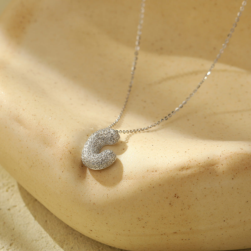 Collier Lettres Bubble en Acier Inoxydable – Élégance et Modernité