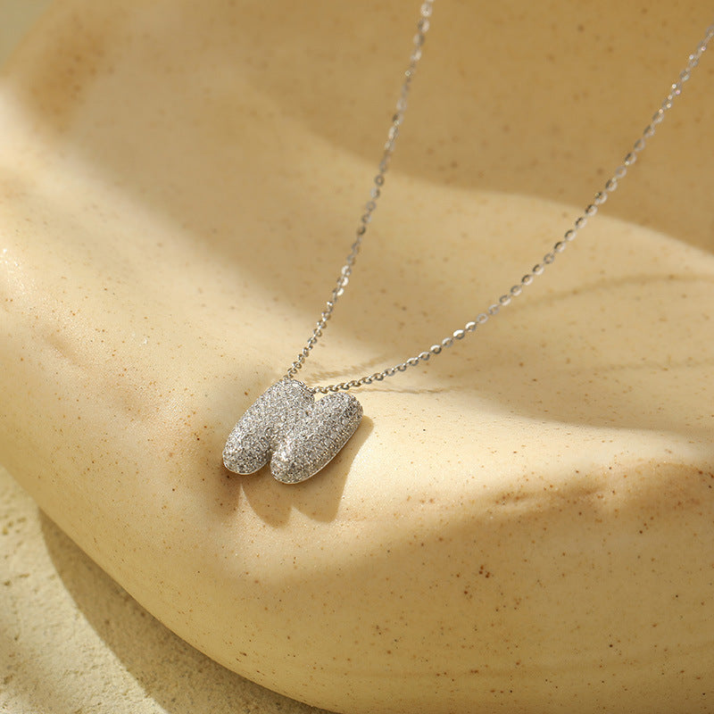 Collier Lettres Bubble en Acier Inoxydable – Élégance et Modernité