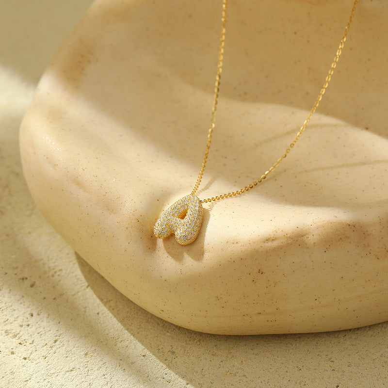 Collier Lettres Bubble en Acier Inoxydable – Élégance et Modernité