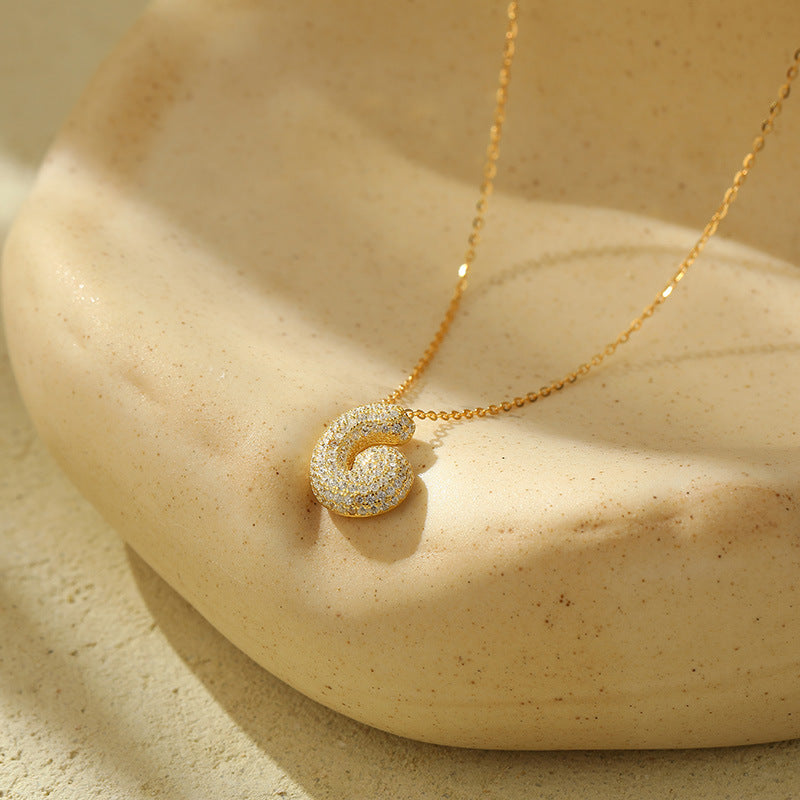 Collier Lettres Bubble en Acier Inoxydable – Élégance et Modernité