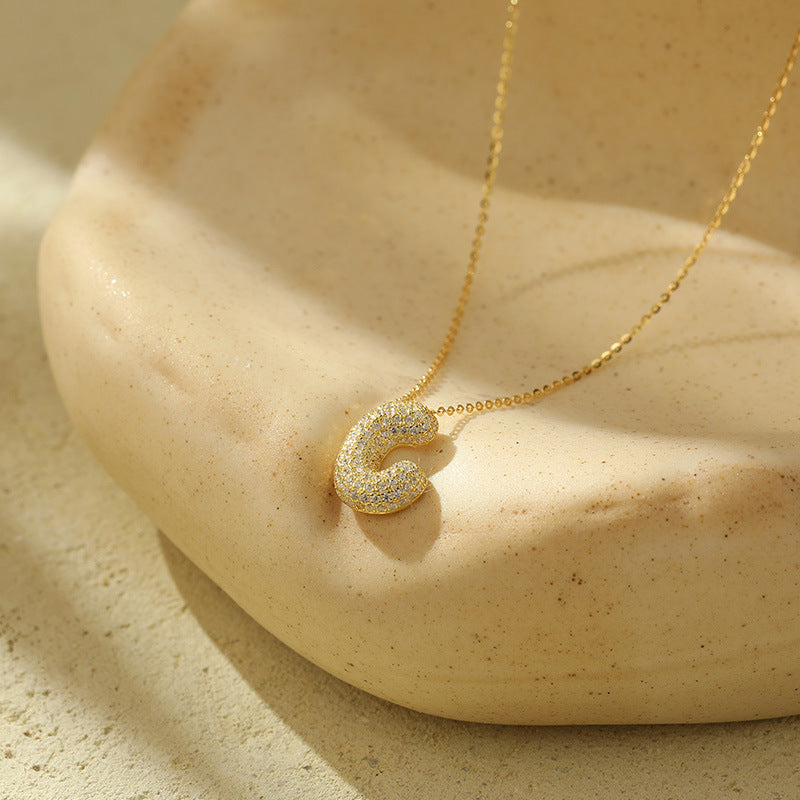 Collier Lettres Bubble en Acier Inoxydable – Élégance et Modernité