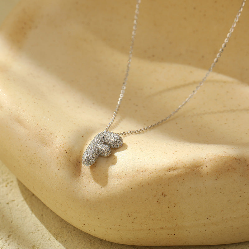 Collier Lettres Bubble en Acier Inoxydable – Élégance et Modernité