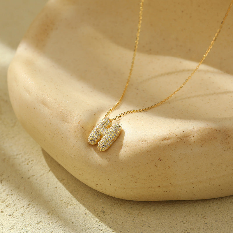 Collier Lettres Bubble en Acier Inoxydable – Élégance et Modernité