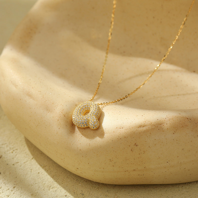 Collier Lettres Bubble en Acier Inoxydable – Élégance et Modernité