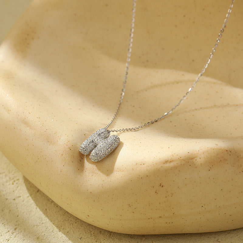 Collier Lettres Bubble en Acier Inoxydable – Élégance et Modernité