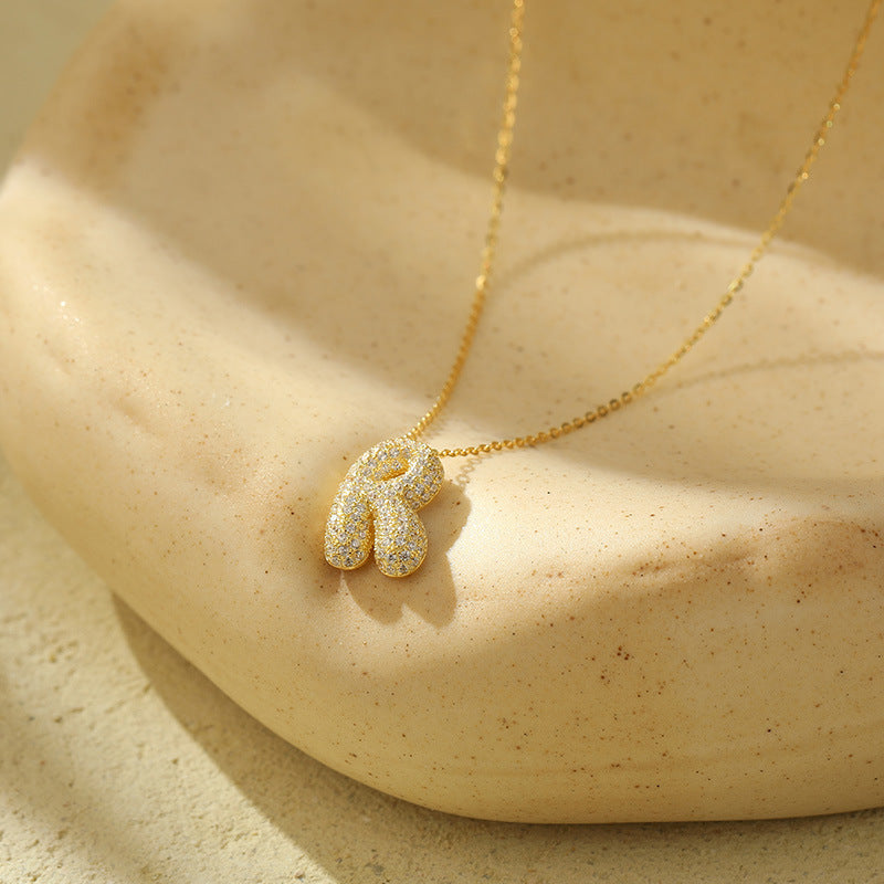 Collier Lettres Bubble en Acier Inoxydable – Élégance et Modernité