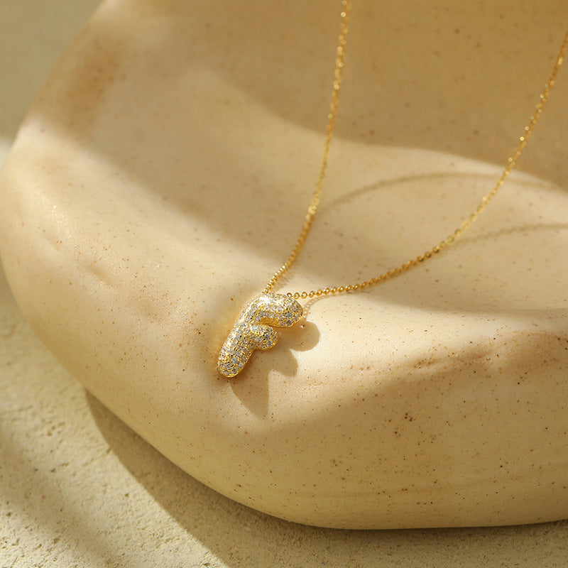 Collier Lettres Bubble en Acier Inoxydable – Élégance et Modernité