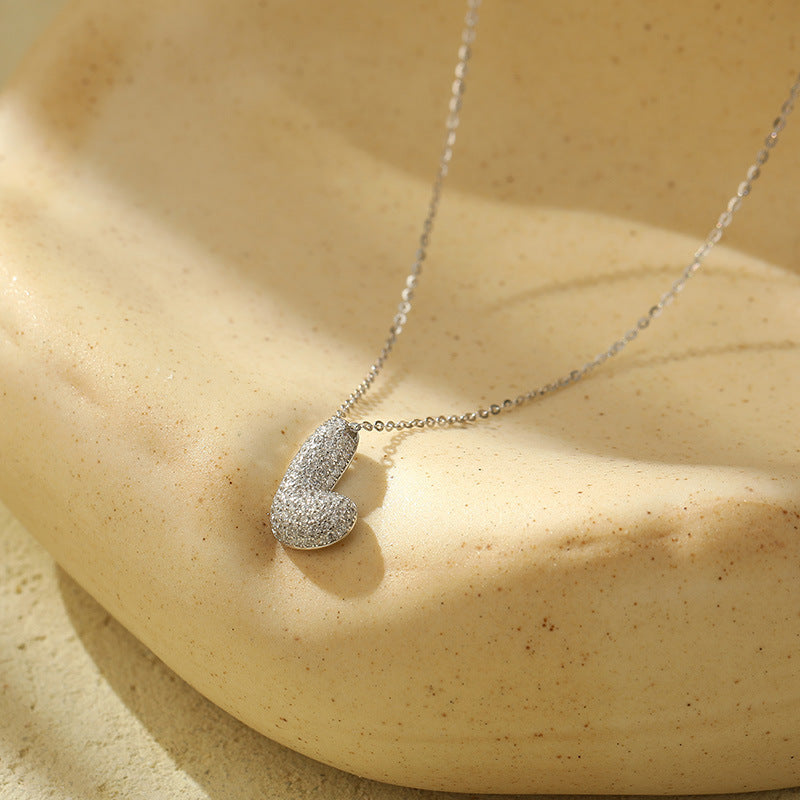 Collier Lettres Bubble en Acier Inoxydable – Élégance et Modernité