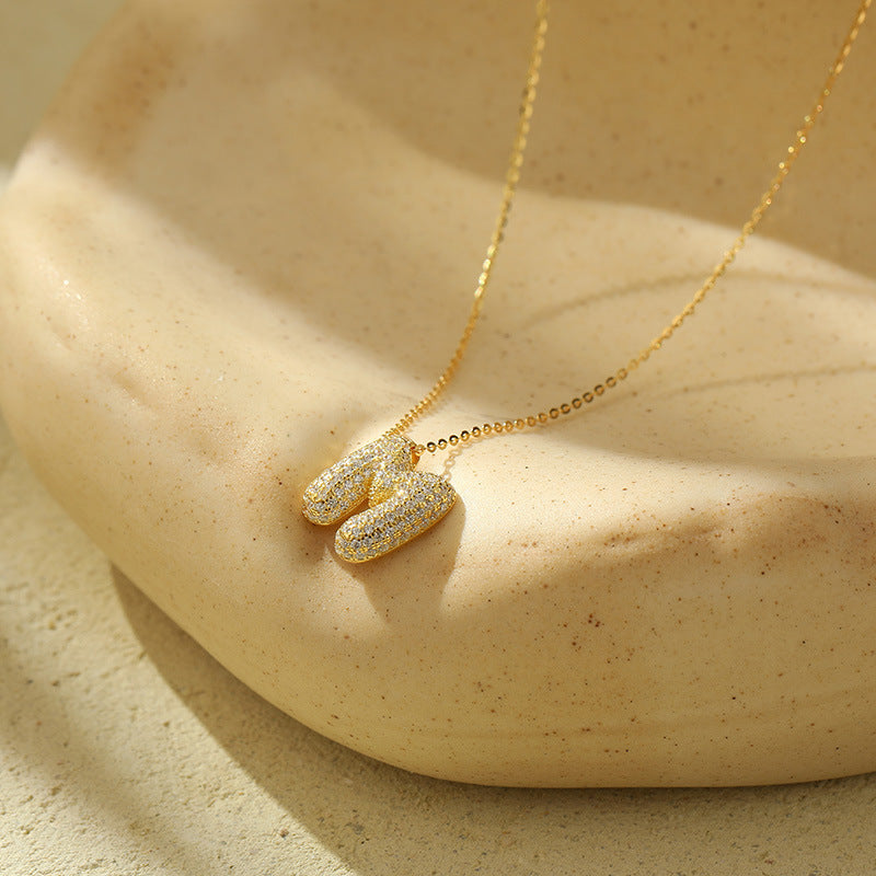 Collier Lettres Bubble en Acier Inoxydable – Élégance et Modernité