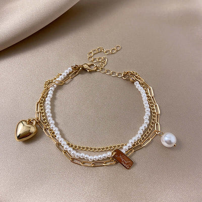 Bracelet Double Couches Cœur et Perles – Charme Rétro et Raffiné - 𝓑𝓲𝓳𝓸𝓾𝔁𝓒𝓪𝓮𝓵𝔂𝓼 - Collier - 𝓑𝓲𝓳𝓸𝓾𝔁𝓒𝓪𝓮𝓵𝔂𝓼 - 