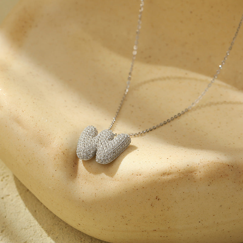 Collier Lettres Bubble en Acier Inoxydable – Élégance et Modernité